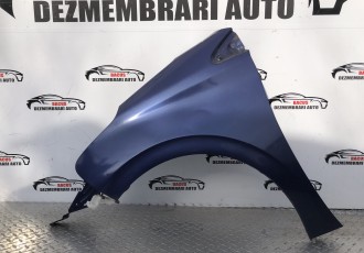 Aripă stânga față pentru Peugeot 208, an 2010