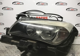 Far BMW X1 2012-Stanga COD- 6311735744702